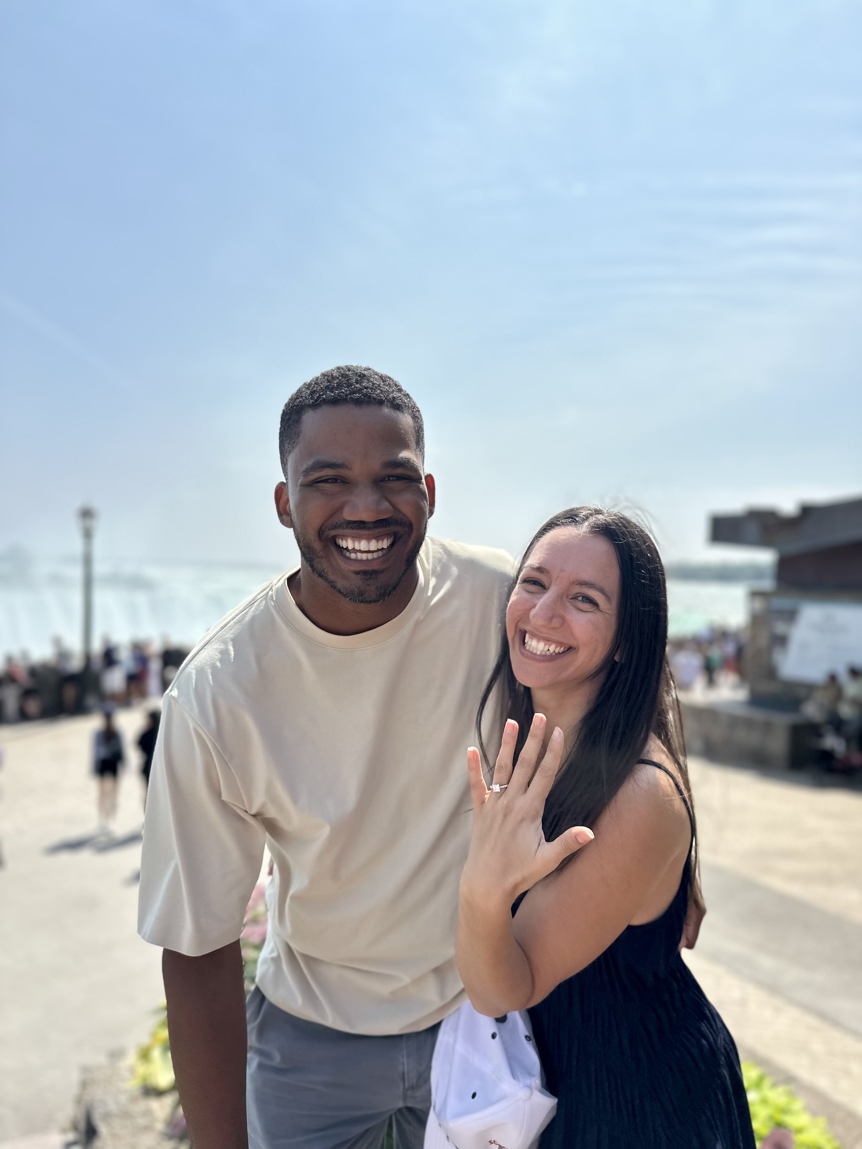 Laura and Donnie standing together in the forest